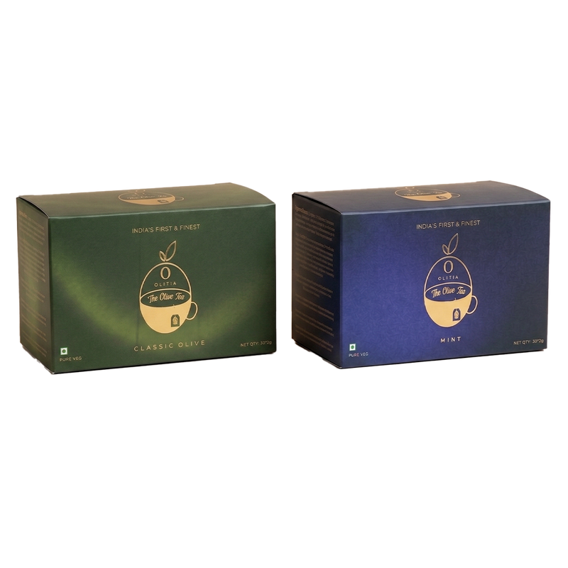 Two tea boxes, one green and one blue, on a white background