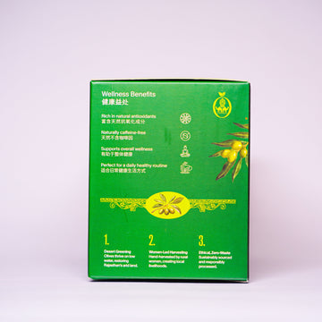 A green product box with yellow and white text and graphics, standing upright against a light gray studio background.