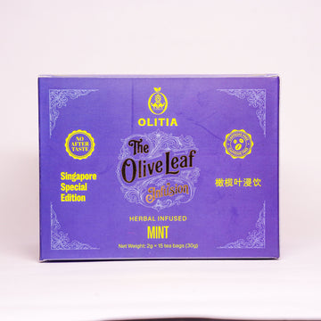 A purple rectangular box of Olitia The Olive Leaf Garden Herbal Infused Mint tea, featuring gold and white decorative text and borders, set against a plain white background.