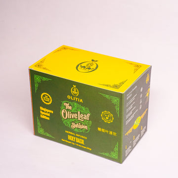 A rectangular product box for Oltia The Olive leaf Solution Holy Bark, featuring a yellow top and green sides with printed text and logos, photographed on a plain light background.
