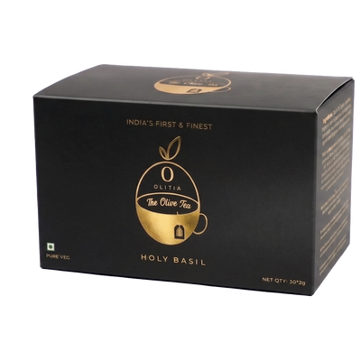Black tea box with gold logo and text on a white background